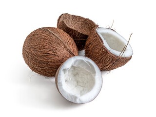 Coconut halves with white flesh and fibrous shell on a white background