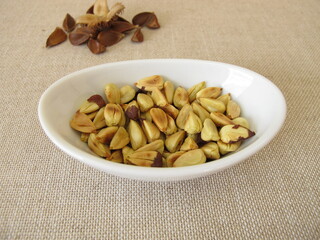 A small bowl of freshly roasted beechnuts
