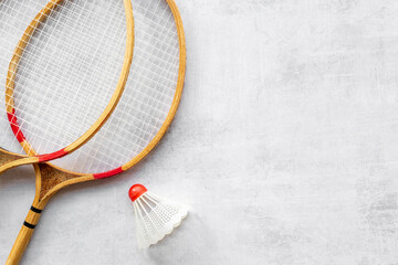 Flat lay of badminton rackets and shuttlecock. Top view