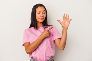 Young latin woman isolated on white background  smiling cheerful showing number five with fingers.