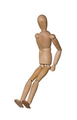 wooden mannequin sitting stretching out legs, isolated on white background