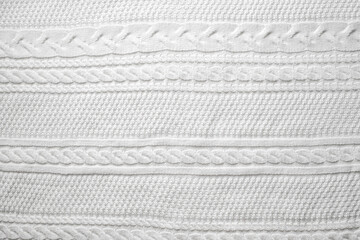 Beautiful white hand knit pattern. Woolen knitting background