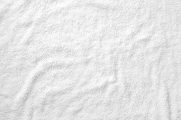 Background of white plush fabric.