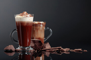 Hot chocolate and pieces of dark chocolate.