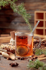 Hot herbal tea with cinnamon, anise, and dried herbs.