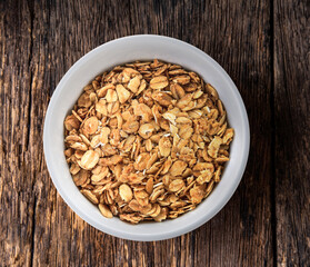 muesli in wood bowl on wood