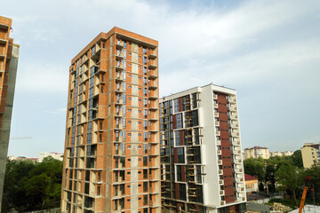 High residential apartment buildings under construction. Real estate development