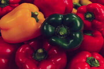 Fresh red, green, yellow bell pepper background.