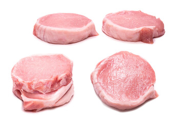 Raw pork pieces isolated on a white background.