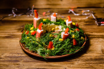 Festive salad in shape of the Christmas wreath. Christmas and new year celebration