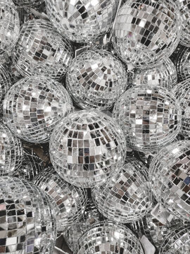 Sale of little disco balls for Christmas tree. Decorative mirror balls for New Year celebration.