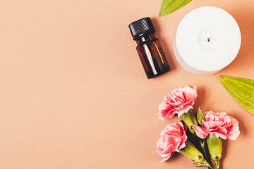 Aromatherapy flat lay with bottle of essential oil