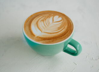 A cup of Hot coffee cappuccino on white background