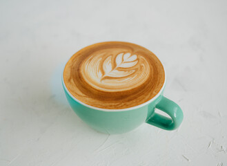 A cup of Hot coffee cappuccino on white background