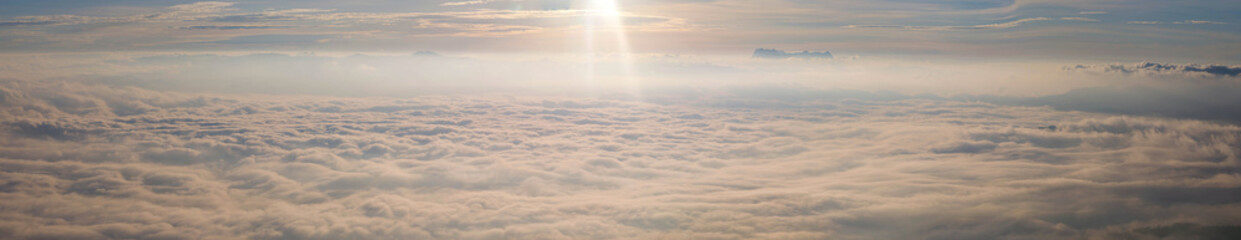 Heaven at early sunrise predawn clear sky over the mountains with the morning mist. Panorama