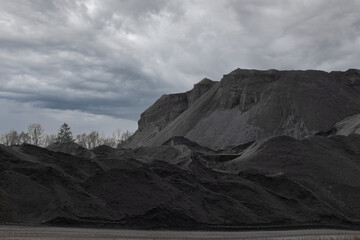 Stone top, composition of building materials. Basalt mine.