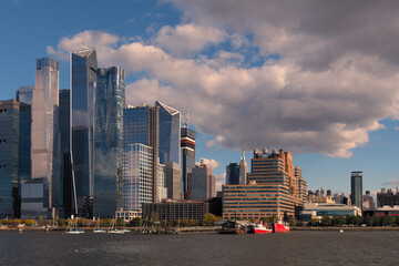 A photograph of the Manhattan skyline taken during the day from the Circle Line Cruise boat.