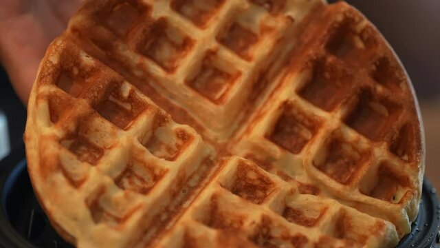 Freshly made waffles cooling and ready for a big family breakfast feast