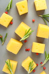 Flat lay composition with hard cheese gray background