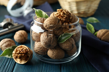 Concept of healthy food with walnuts on wooden background