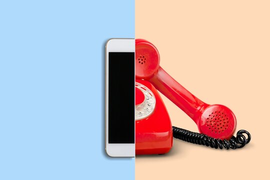 Old vs new technology. Retro phone and modern smartphone