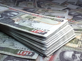 Kenyan money. Kenyan shilling banknotes. 100 KES shillings bills.