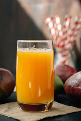 Mango juice in a glass, fresh fruit drink