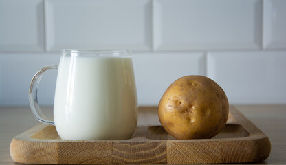 Powdered vegan milk. Potato milk close-up. Selective focus. Side view