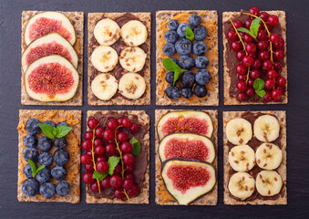 Crispbread with banana  blueberry redcurrant and figs