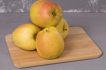 Fresh apple on a wooden desk