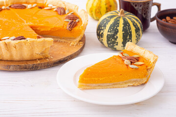 Traditional American autumn dessert . Pumpkin pie