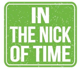 Fototapeta premium IN THE NICK OF TIME, text written on green stamp sign