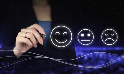 Smiley Face Rating for a Satisfaction Survey. Hand holding digital graphic pen and drawing digital...