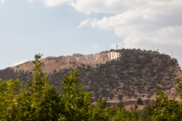 High stone mountain and marble quarries in Turkey. Open marble mining. Environment mining