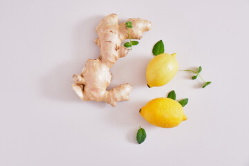 mint, lemon, ginger on a grey background. copy space