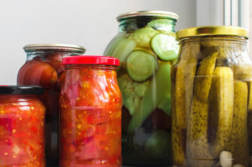Preserved food in glass jars. Harvesting food for the winter at home.