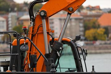 Excavator on urban street