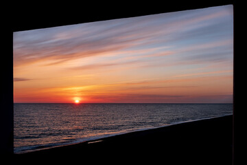 the silhouette of the window is at an angle to the horizon