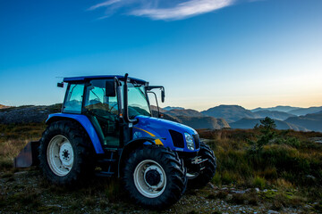 Fototapeta premium tractor on the field