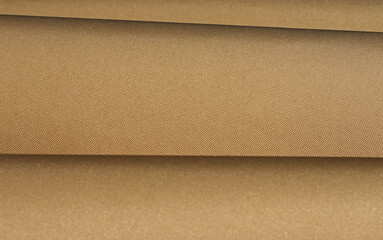 Fototapeta premium brown wavy drapery fabric texture background