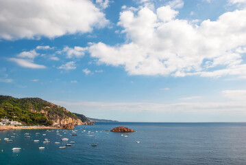 Tossa De Mar, Catalonia, Spain. A picturesque town with a fortress, with beautiful beaches and clean turquoise water in cozy bays near Barcelona. Famous tourist destination Costa Brava.