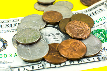 American one dollar and cents..Inflation rate. Economic crisis. Сurrency devaluation. Business concept. Close up, soft focus.