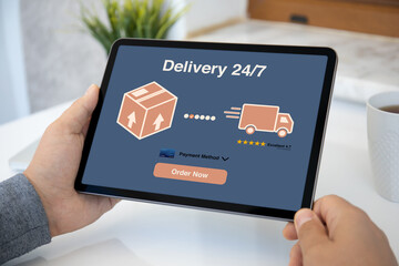 male hands holding computer tablet with parcel delivery application