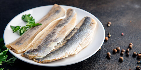 herring fish fillet Norwegian fresh seafood meal snack on the table copy space food background