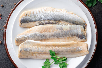 herring fish fillet Norwegian fresh seafood meal snack on the table copy space food background