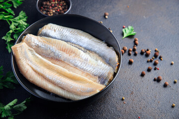 herring fish fillet Norwegian fresh seafood meal snack on the table copy space food background