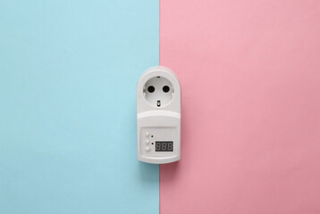 Fuse electrical socket on blue pink pastel background