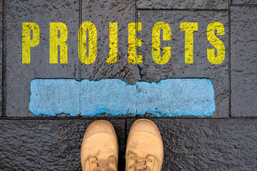 concept message in the road with feet - projects
