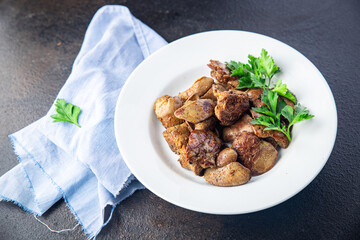 chicken liver food fried or stewed offal meal snack on the table copy space background rustic. top view 