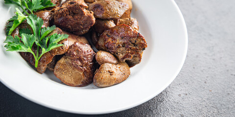 chicken liver food fried or stewed offal meal snack on the table copy space background rustic. top view 